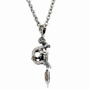 Snake and Skull Tattoo Machine Silver Pendant shown in machine hanging on chain view.