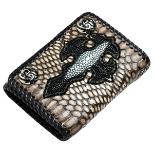 Closed snake and stingray cross wallet photographed at an angle against white.