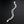 Full length view of solid silver curb chain bracelet 70 grams on dark background