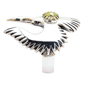 A spiritual bird ring in the shape of a Native American bird, isolated on a white background to showcase its form.