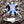 A gothic-style ring with monster talons holding a large blue sapphire, a piece of men's fantasy jewelry.