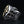Sterling silver medieval shield ring with a gold-plated cross — side scrollwork detail