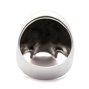 Sterling silver skull ring with a garnet eye — interior view