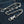 Sterling Silver Slash Flame Skull Wallet Chain — coiled chain on denim