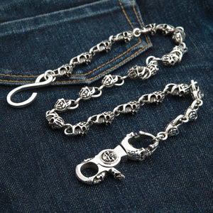 Sterling Silver Slash Flame Skull Wallet Chain — coiled chain on denim
