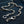 Sterling Silver Slash Flame Skull Wallet Chain — full hardware denim view