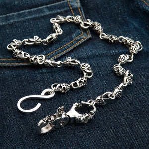 Sterling Silver Slash Flame Skull Wallet Chain — full hardware denim view