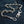 Sterling Silver Slash Flame Skull Wallet Chain — skull clasp denim view