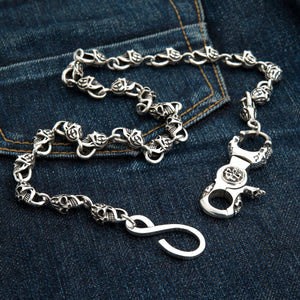 Sterling Silver Slash Flame Skull Wallet Chain — skull clasp denim view