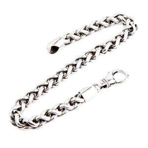 Bracciale a spiga aperto che mostra la lunghezza della catena ed entrambi i terminali.
