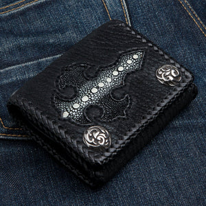 Black Stingray Cross Trifold with Silver Flame Snaps showing the cross inlay, pearl stripe and flame snaps from a low angle.