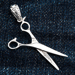Engraved Scissors Sterling Silver Pendant shown in good vibrations reverse view.