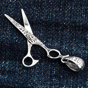 Engraved Scissors Sterling Silver Pendant shown in ornate bail angle view.