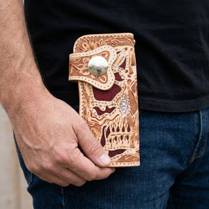 Tan Floral Skull Stingray Inlay Biker Wallet, held in hand