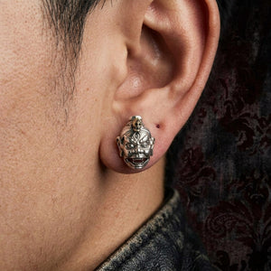 Tibetan Devil Mask Sterling Silver Earrings worn on ear