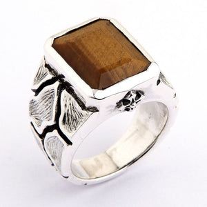 Tiger's Eye Ring with Textured Sterling Silver Band. The rectangular tiger-eye stone sits within a polished silver bezel above the textured shoulders.