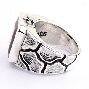 Tiger's Eye Ring with Textured Sterling Silver Band. The smooth inner band is visible beneath the textured setting.