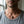 Кулон «Сахарный череп в цилиндре» из стерлингового серебра на шее взрослого человека