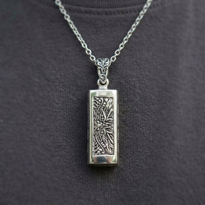 Tribal Demon Sterling Silver Harmonica Pendant, worn chest detail