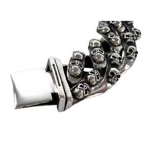 Tribal Multi-Skull Sterling Silver Bracelet, open clasp tongue and raised skull link detail