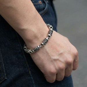 Tribal Roller-Link Sterling Silver Bracelet, worn with the clasp hidden under the wrist