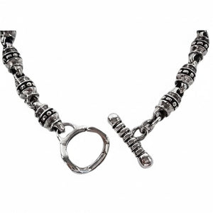 Bracelet tribal à maillons cylindriques en argent massif — détail du fermoir