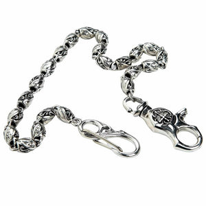 Tribal Barrel-Link Sterling Silver Wallet Chain showing the chain curved between its lobster clasp and snap hook.
