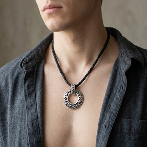 Tribal Shield Loop Sterling Silver Pendant Necklace, worn on the neck with collarbones, shoulders and upper chest visible