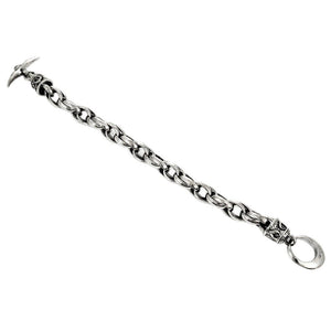 Bracciale a catena in argento sterling con chiusura a T tribal, vista distesa su piano