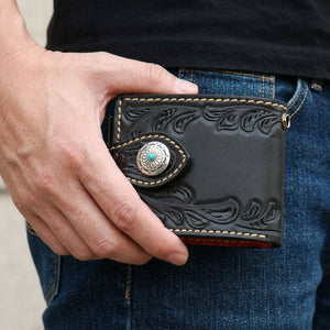 Turquoise Concho Black Leather Biker Wallet, held at hip level