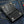 Twin-Flame Concho Black Leather Trifold Wallet, open wallet denim view