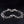 Twin Wolf Head Sterling Silver Curb Bracelet — rear clasp
