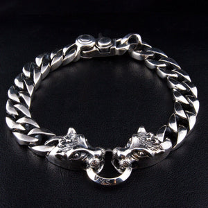 Twin Wolf Head Sterling Silver Curb Bracelet — twin wolf front