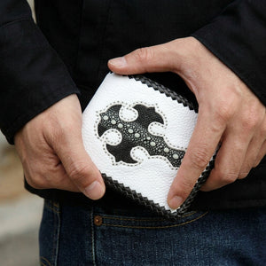 White Leather Black Stingray Cross Wallet, held in hand