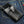 Biker-lommebok i sort rokkeskinn med vinget hodeskalle, vingerelieff bak med utskåret kroklukkingsklaff på denim