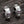 Load image into Gallery viewer, Ruby Skull Sterling Silver Hoop Mens Earrings
