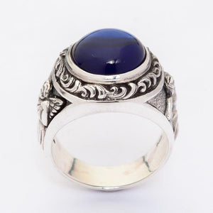 Amor-Liebesring aus Sterlingsilber mit blauem Stein