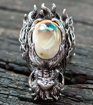 Shiva Shell Dragon 925 Sterling Silver Ring, front view of shell and dragon snout on wood