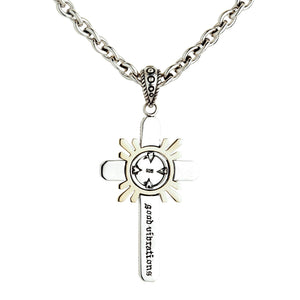 Gothic 'good vibrations' engraving and 925 hallmark visible on the back of the suspended silver cross pendant and chain.