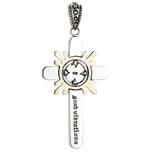 Reverse side of the silver pendant showing the 925 hallmark stamp and 'good vibrations' engraved on the lower arm.