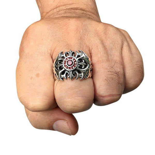 Серебряное кольцо с этническим крестом с гранатом