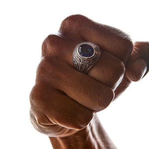Mystic Quartz Union Jack ring worn on a clenched hand