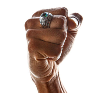 Mystic Quartz silver ring worn on hand gripping leather loop