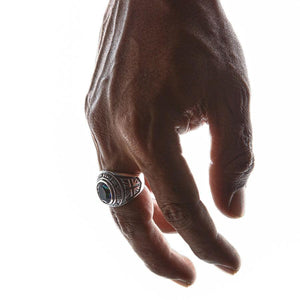 Mystic Quartz silver ring worn on a relaxed downward hand