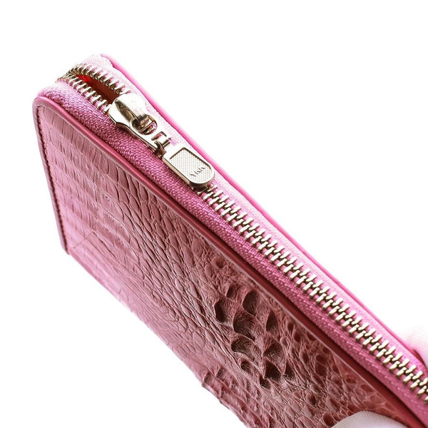 Розовый женский кошелек из кожи крокодила с рогом на спине