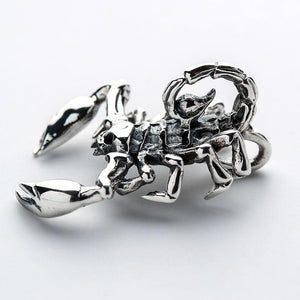 Small Scorpion Sterling Silver Pendant: A side profile view of the 925 silver scorpion pendant, showcasing its arched, segmented tail and menacing stinger