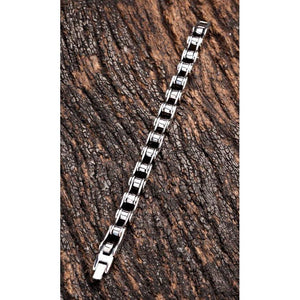 Small Bike Chain Sterling Silver Bracelet, extended full bike-chain bracelet on bark