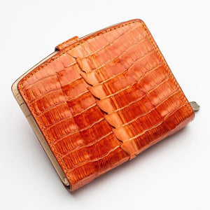 Portefeuilles pour femmes en peau de crocodile orange bicolore