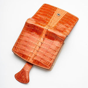 Portefeuilles pour femmes en peau de crocodile orange bicolore