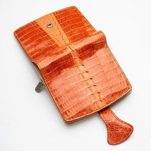 Portefeuilles pour femmes en peau de crocodile orange bicolore